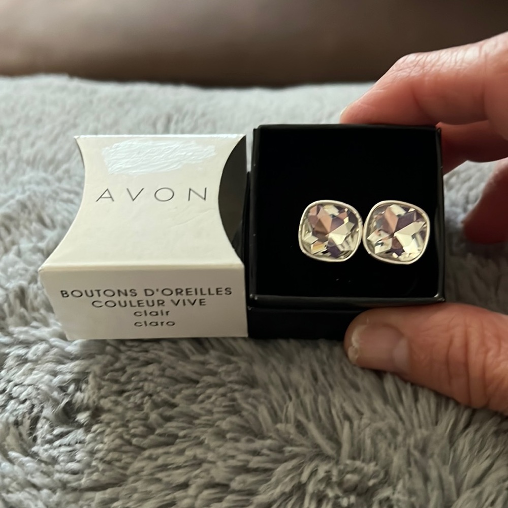 Color brights button earrings by Avon. Clear